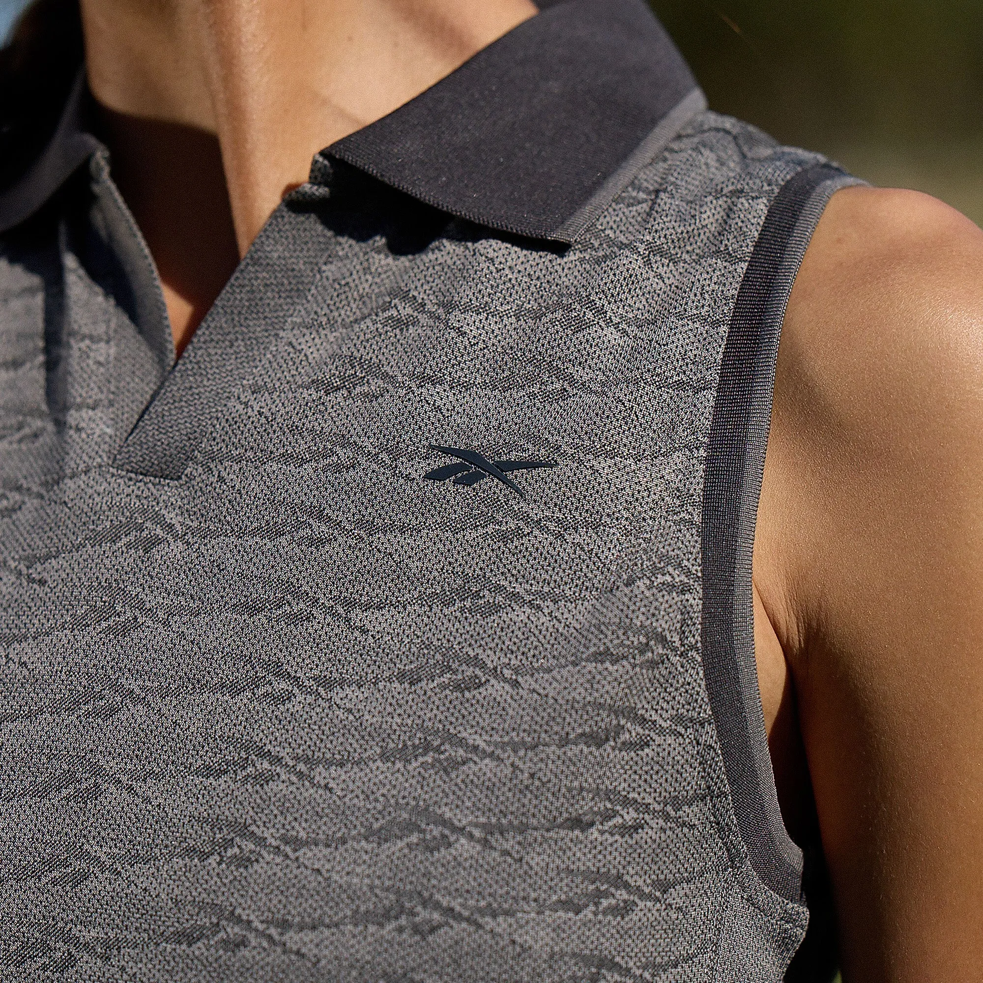 Reebok Shoes Women's Sleeveless Tonal Vector Jacquard Golf Polo Shirt