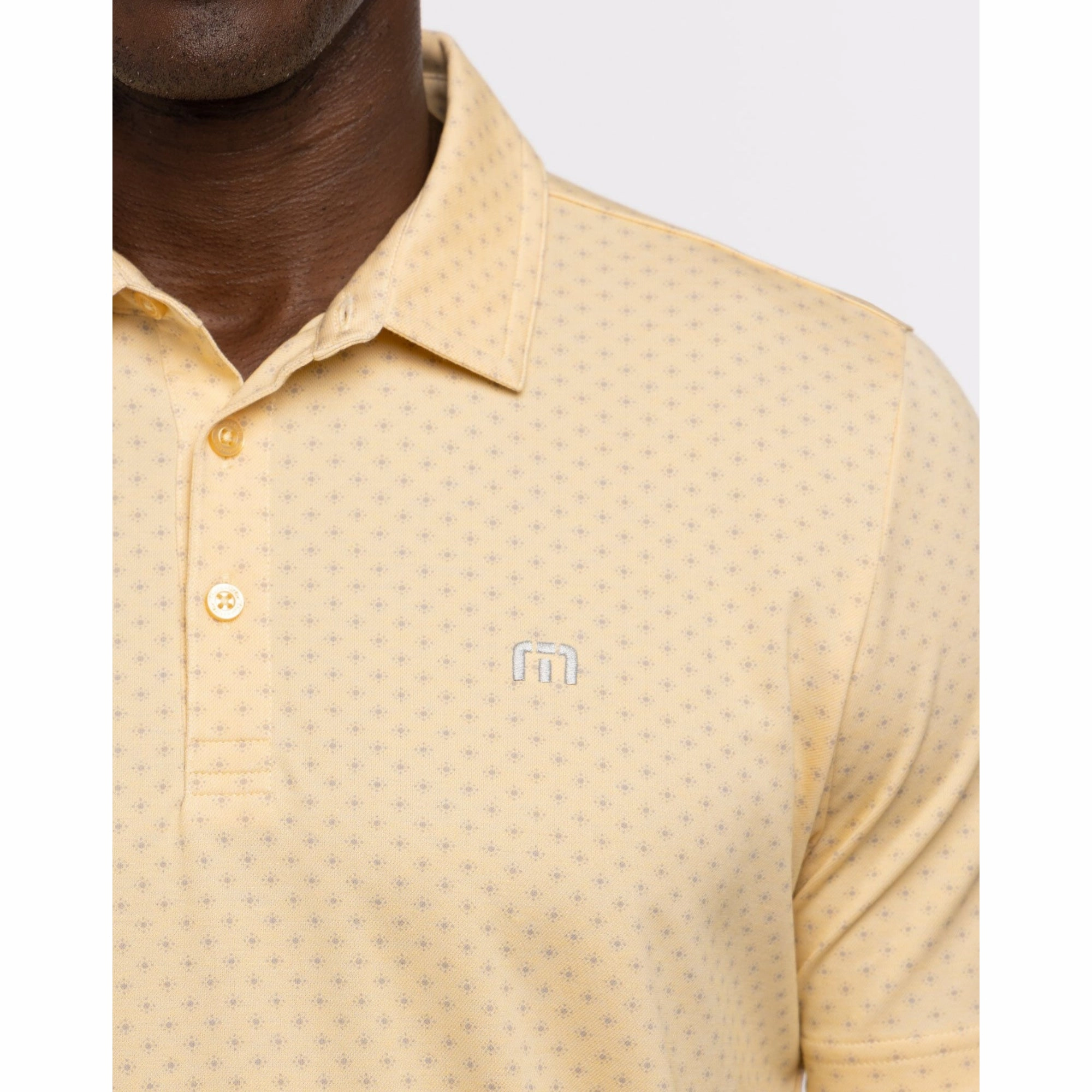 TRAVIS MATHEW MENS BAMBOO CALM POLO - HEATHER GOLDEN CREAM Travis Mathew Men's Golf Apparel