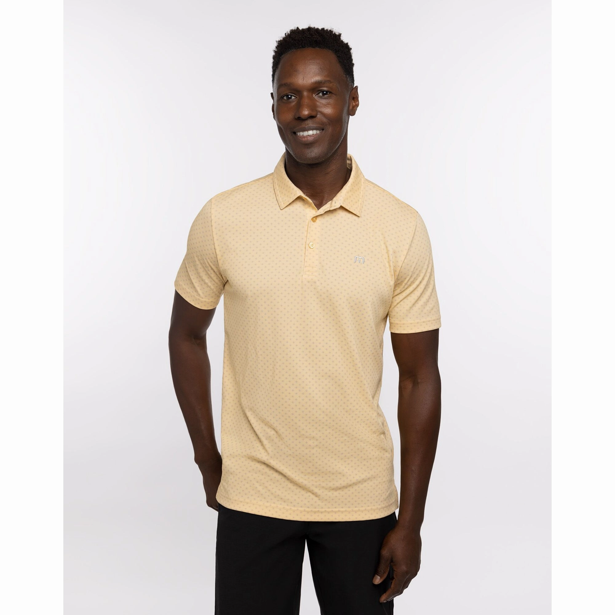 TRAVIS MATHEW MENS BAMBOO CALM POLO - HEATHER GOLDEN CREAM Travis Mathew men's golf apparel