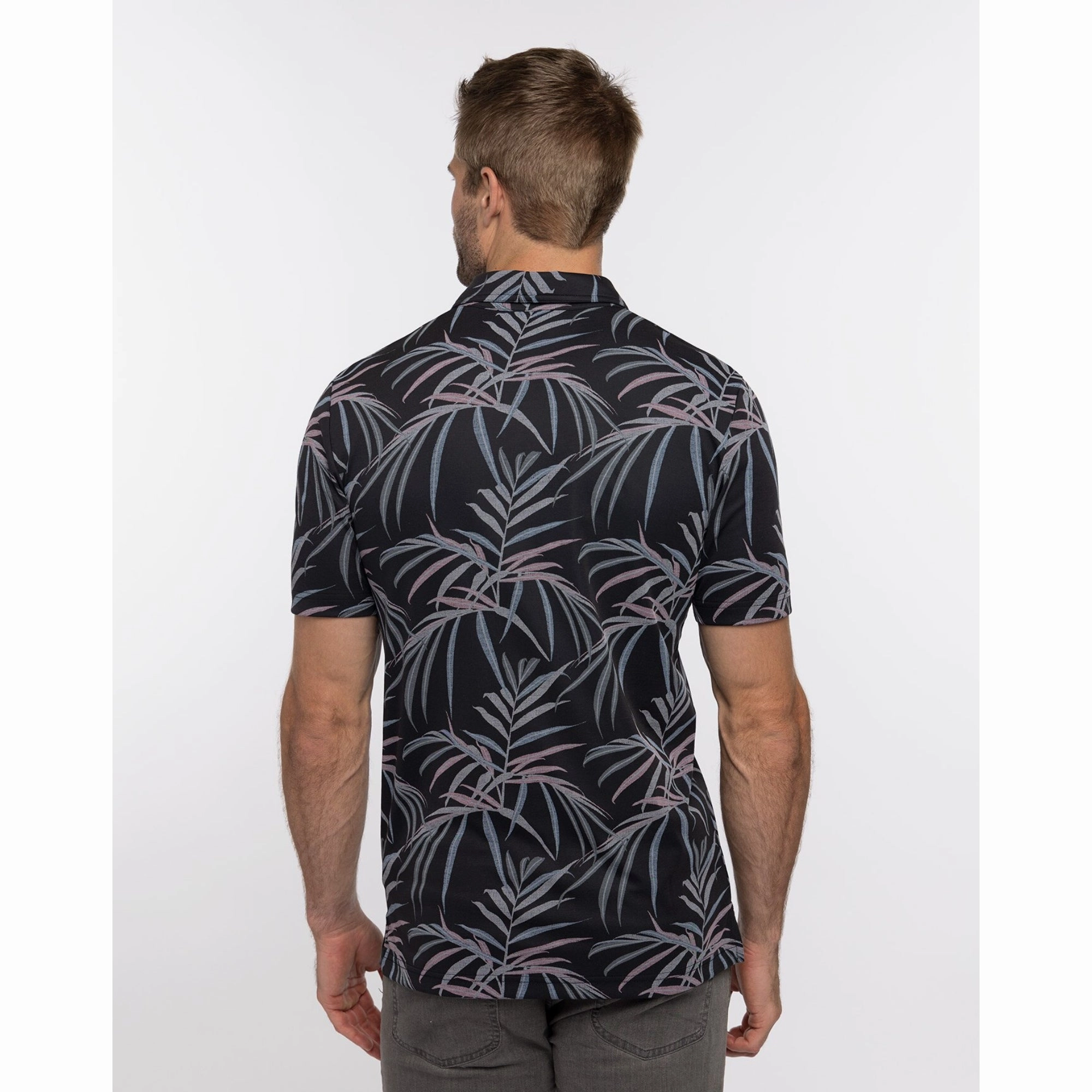 TRAVIS MATHEW MENS BUZZ WORDS POLO - BLACK Travis Mathew Men's Golf Apparel
