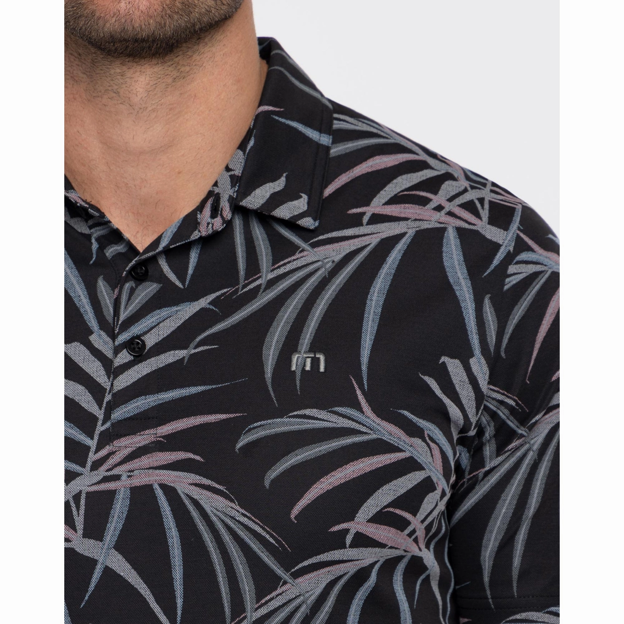 TRAVIS MATHEW MENS BUZZ WORDS POLO - BLACK Travis Mathew Men's Golf Apparel