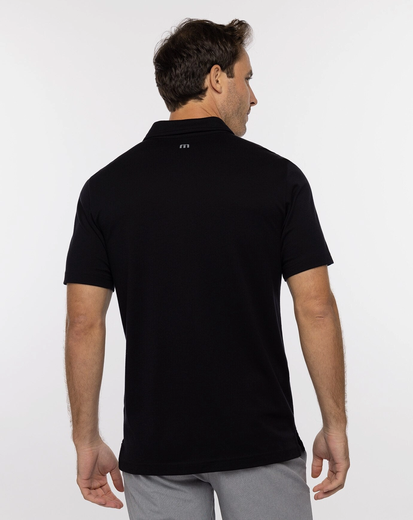 TRAVIS MATHEW MENS HIGH SURF POLO - BLACK Travis Mathew Men's Golf Apparel