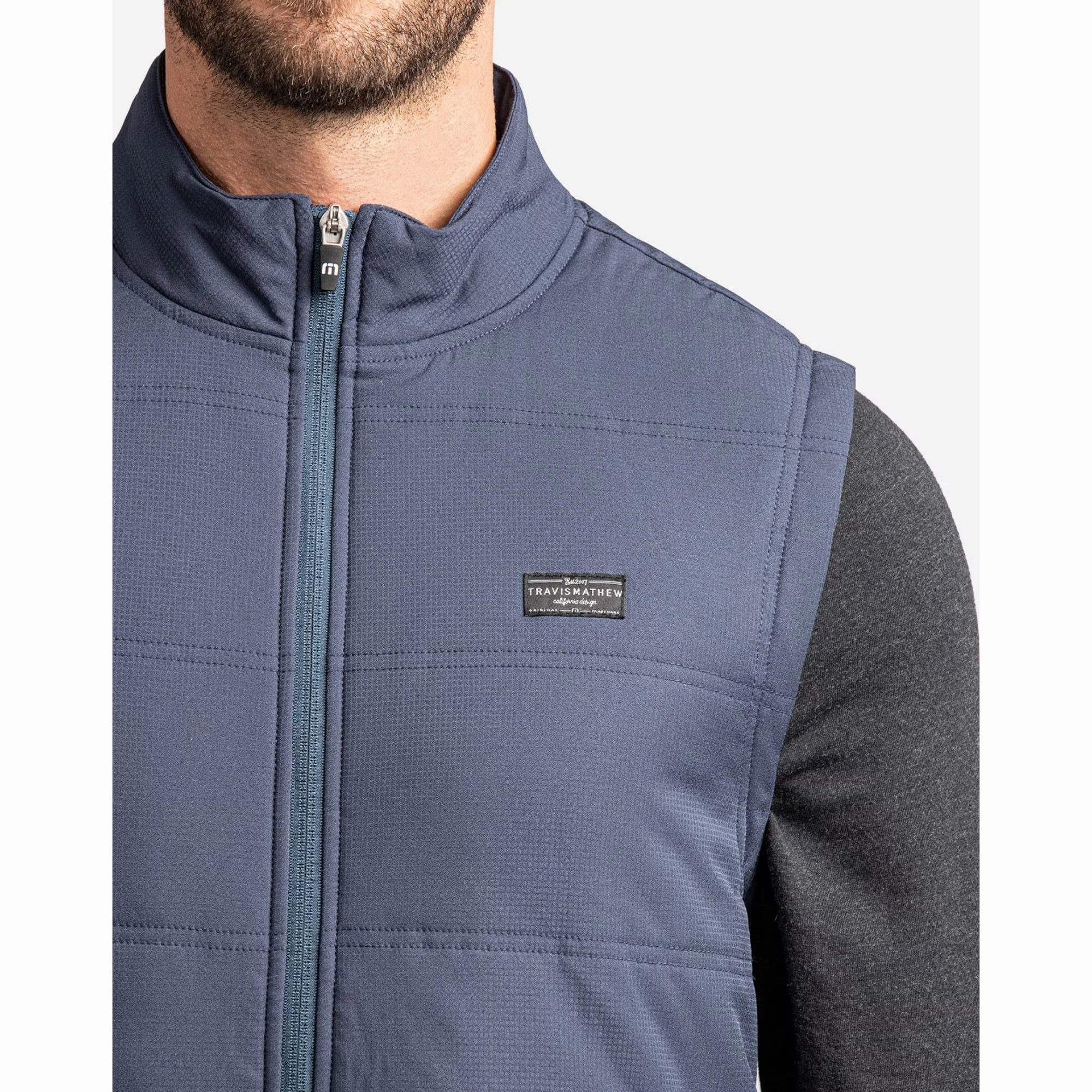 TRAVIS MATHEW MENS INTERLUDE PUFFER VEST - MOOD INDIGO Travis Mathew Men's Golf Apparel