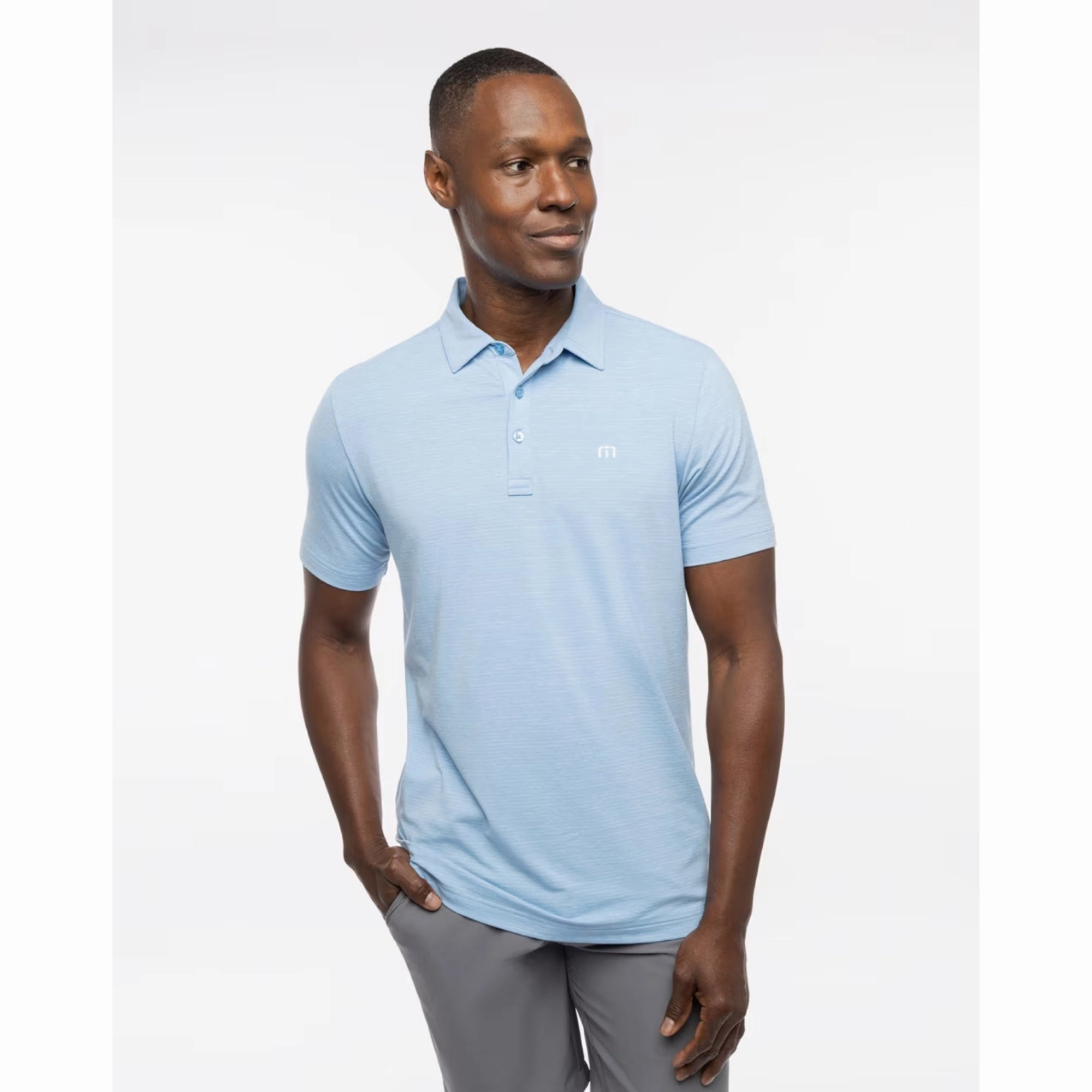 TRAVIS MATHEW MENS THE HEATER POLO - HEATHER HERITAGE BLUE Travis Mathew men's golf apparel