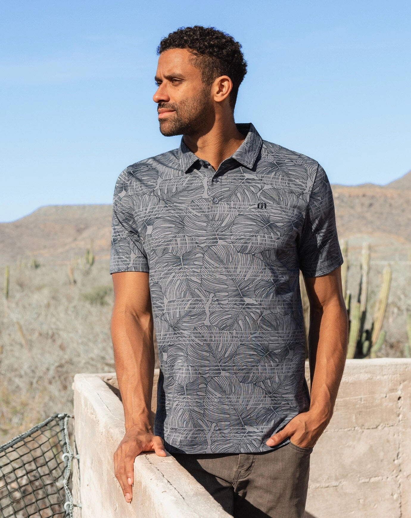 TRAVISMATHEW DOLPHIN DIVE POLO - HEATHER PEACOAT Travis Mathew Men's Golf Apparel